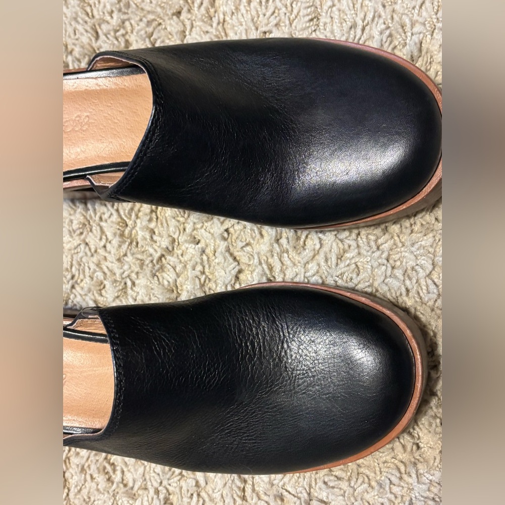 Madewell Black Leather Mules with Wooden Heel
Hardle worn.